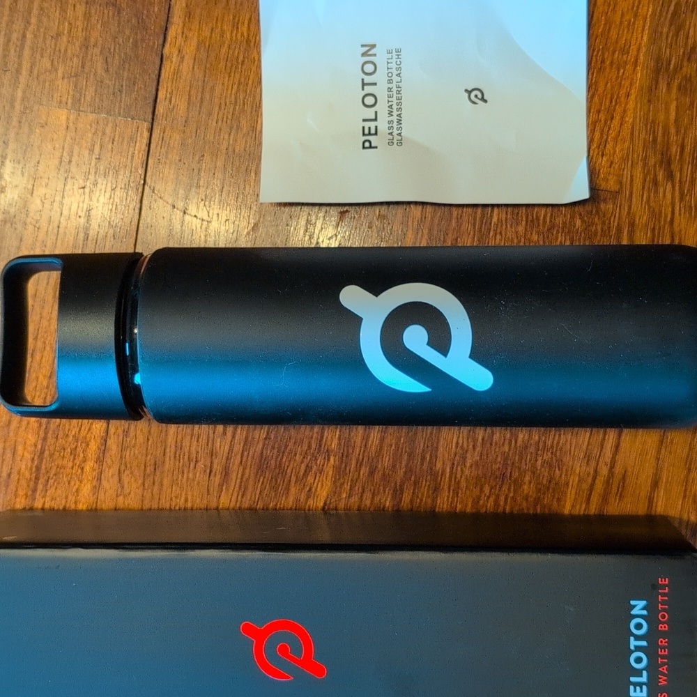Peloton Glass Water Bottle 16 oz. Bottle with Non-Slip Silicone Sleeve easy open